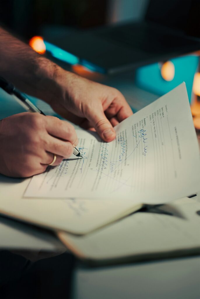 Signing land purchase documents before a property transfer