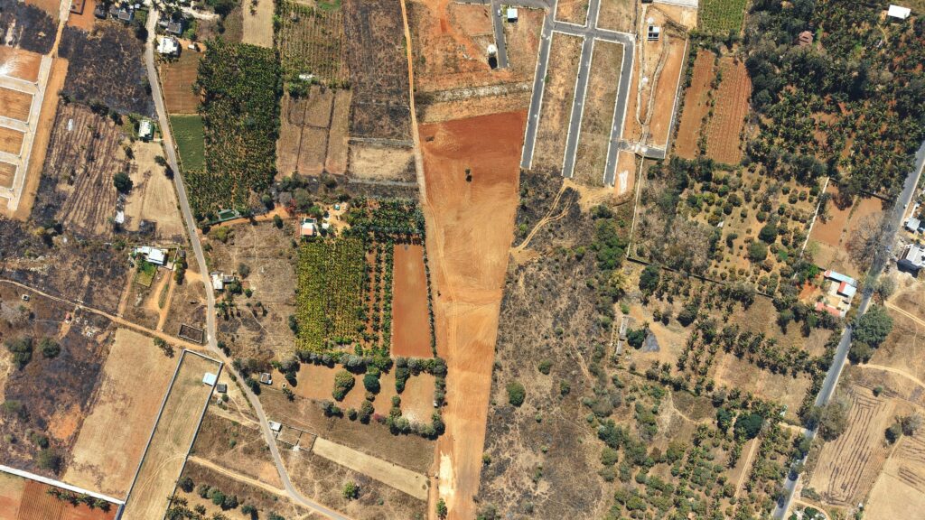 Aerial view of divided plots, the basis of Punjab land measurement in marla and kanal