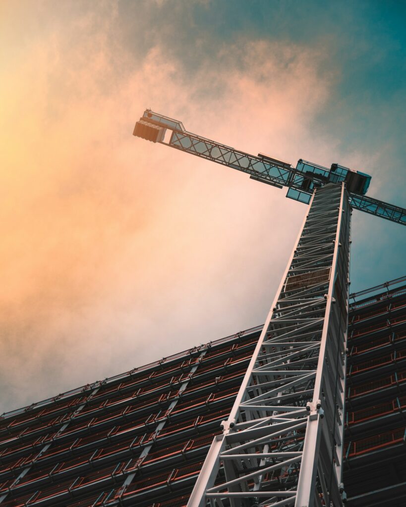 Tower crane over a project where developers pay edc charges in haryana
