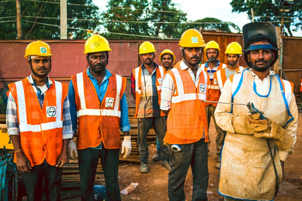 Site engineers in reflective vests checking construction progress