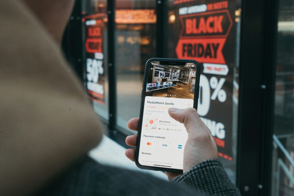 Property buyer browsing OLX listings on an Android smartphone