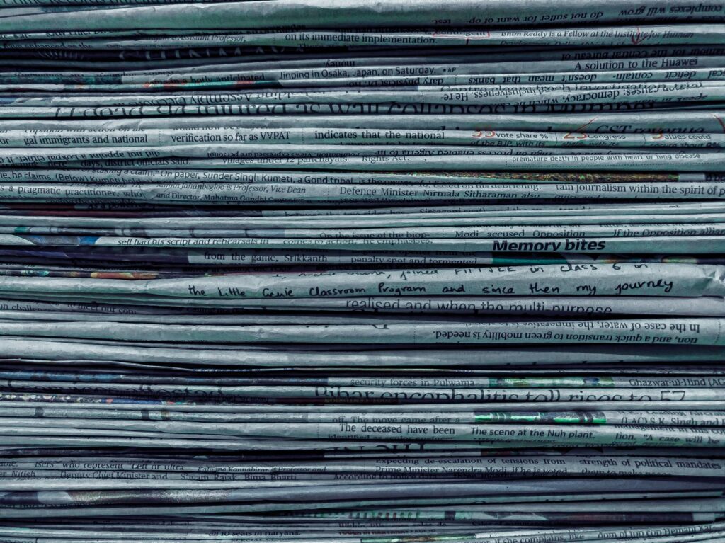 Stack of regional newspapers carrying property advertisements