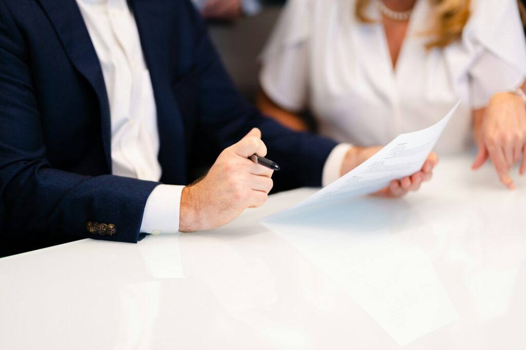 Property dealer meeting a client at an office table