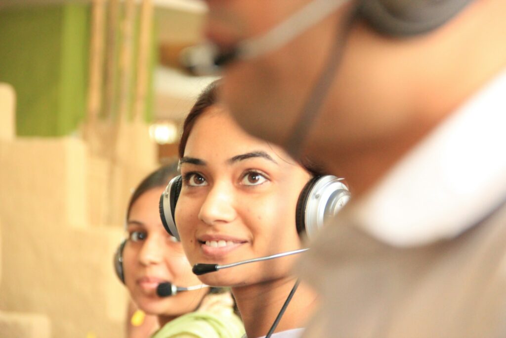 Real estate tele-calling team making follow-up calls to leads